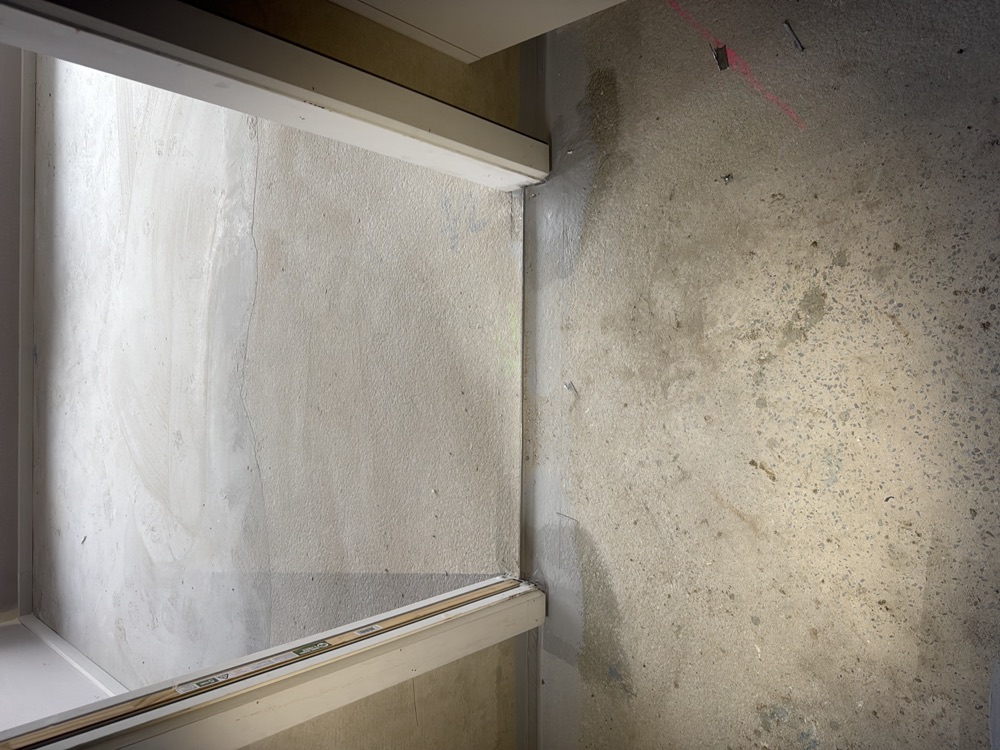 Inadequate doorway water stop and membrane termination, recorded on a fixing stage inspection in Nar Nar Goon, 5 km from Pakenham East