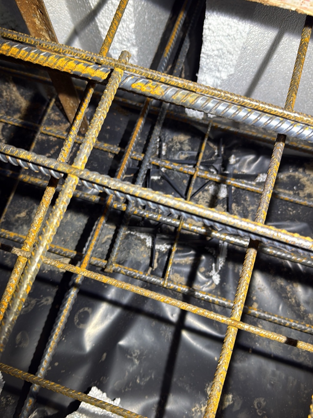 Trench mesh not held on bar chairs, recorded on a slab pre-pour inspection in Nar Nar Goon, 5 km from Pakenham East