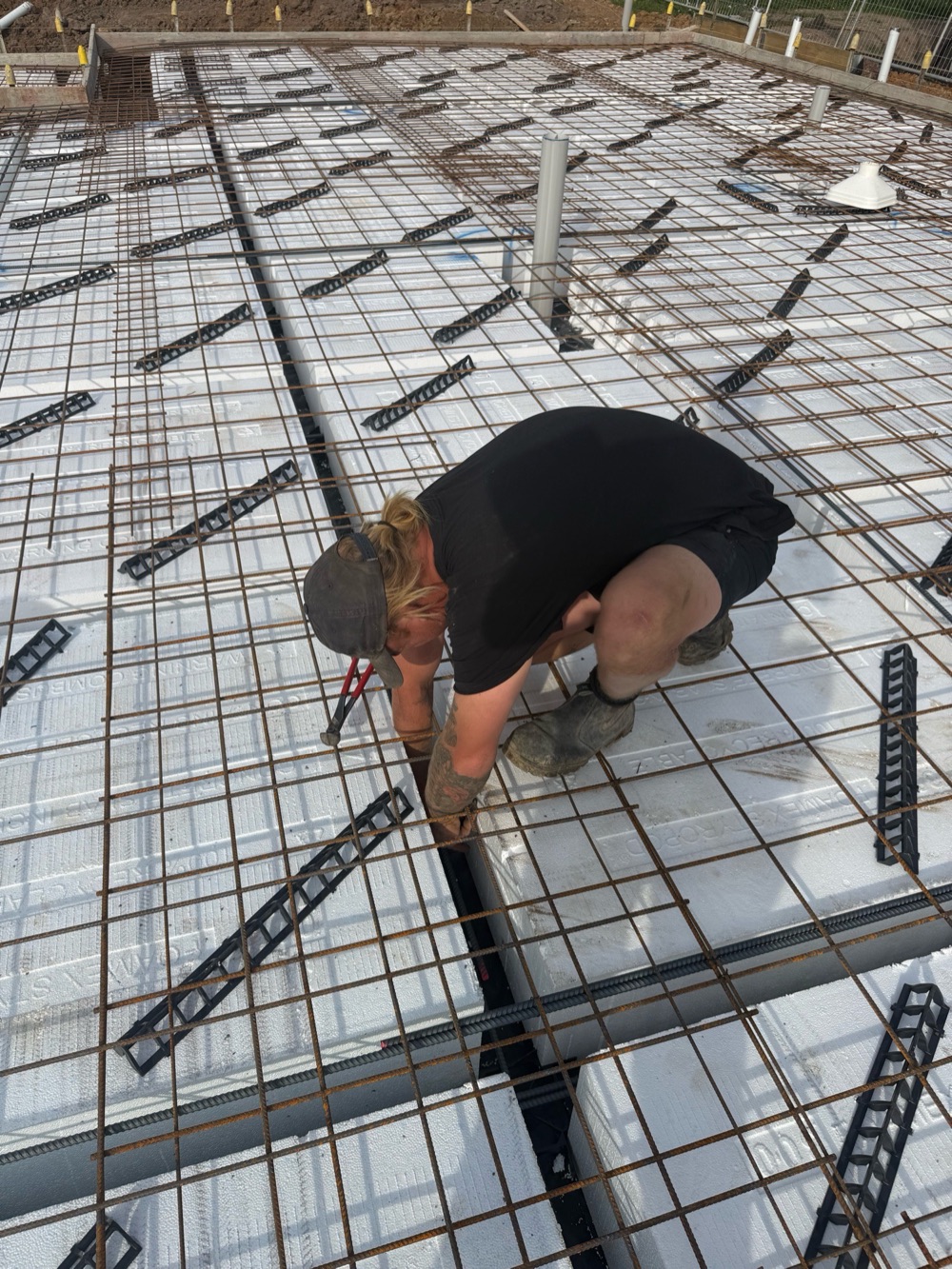 Insufficient reinforcement fixing, recorded on a pre-pour inspection in Nar Nar Goon, 5 km from Pakenham East