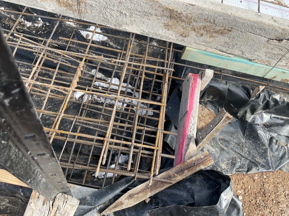 Vapour barrier not carried beneath the whole slab, recorded on a slab pre-pour inspection in Officer, 10 km from Pakenham East