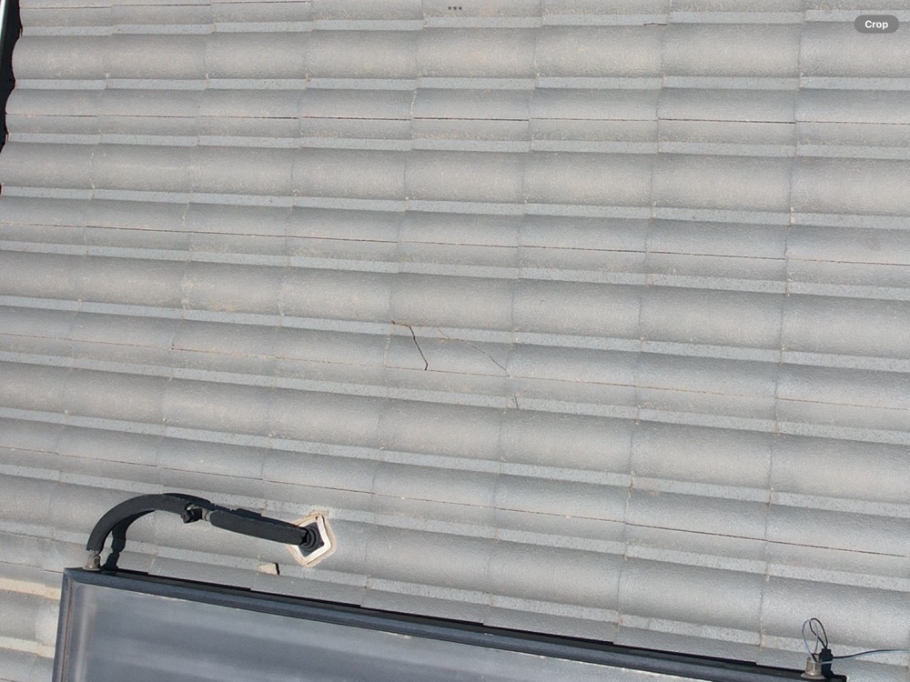 Cracked roof tile, recorded on a pre-purchase inspection in Officer, 10 km from Pakenham East