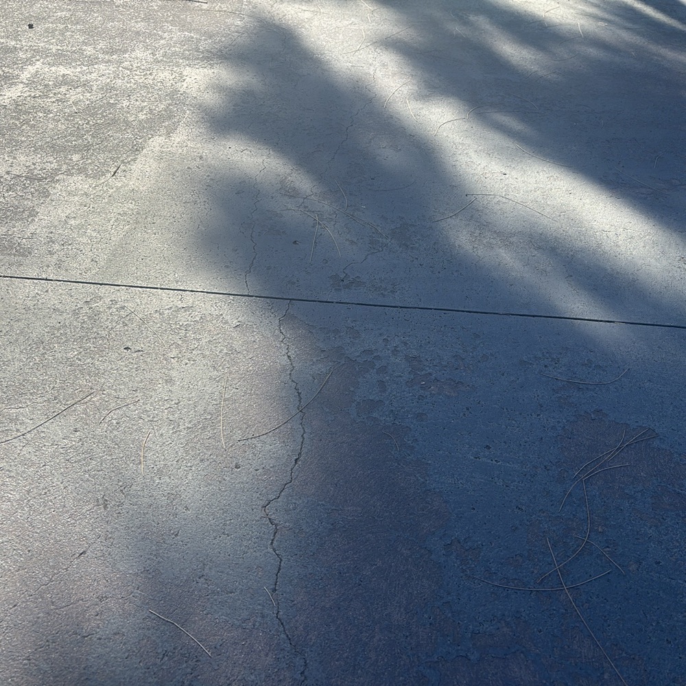 Moderate cracking through paving, Pakenham East